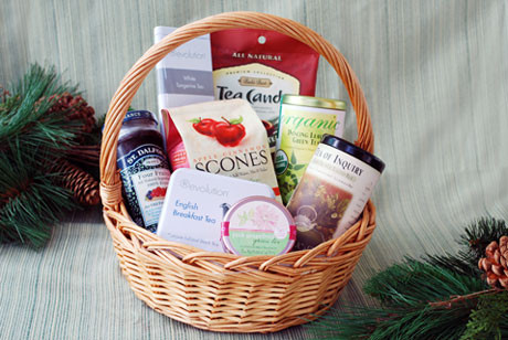 The Tea Time Basket features a variety of organic and exotic teas, scones, fruit jam and candy.