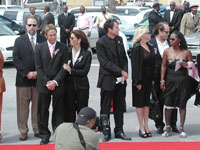 Loved ones line the red carpet