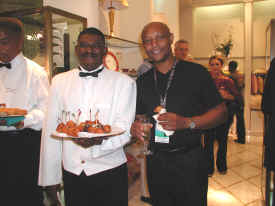 Artist Antonius Roberts enjoying the tasty hors d' oeuvres