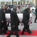 Ribbon-Adorned Coffin