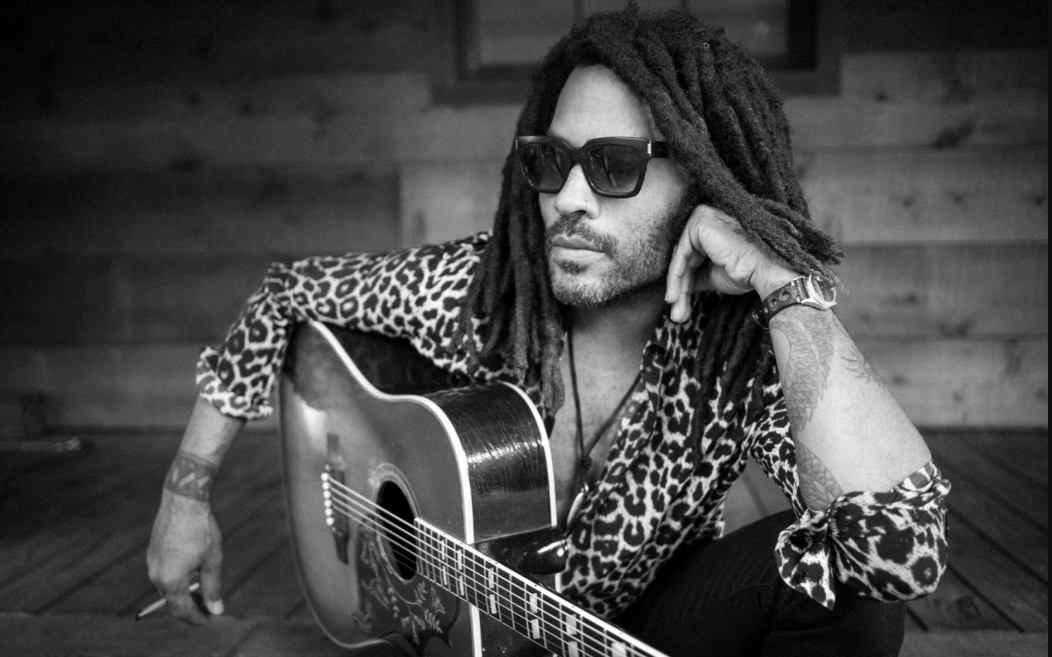 Image of Lenny Kravitz hilding guitar