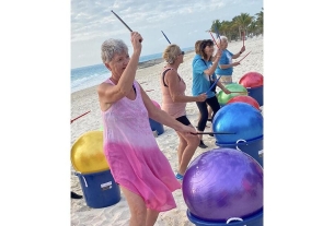 Villagers take cardio drumming to the Bahamas